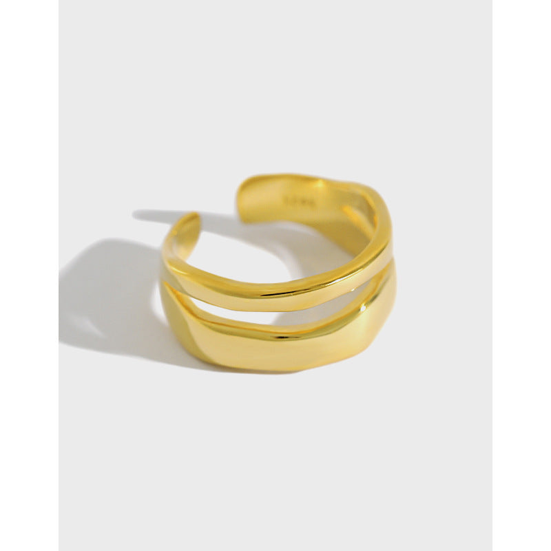 Gold ring on a white background